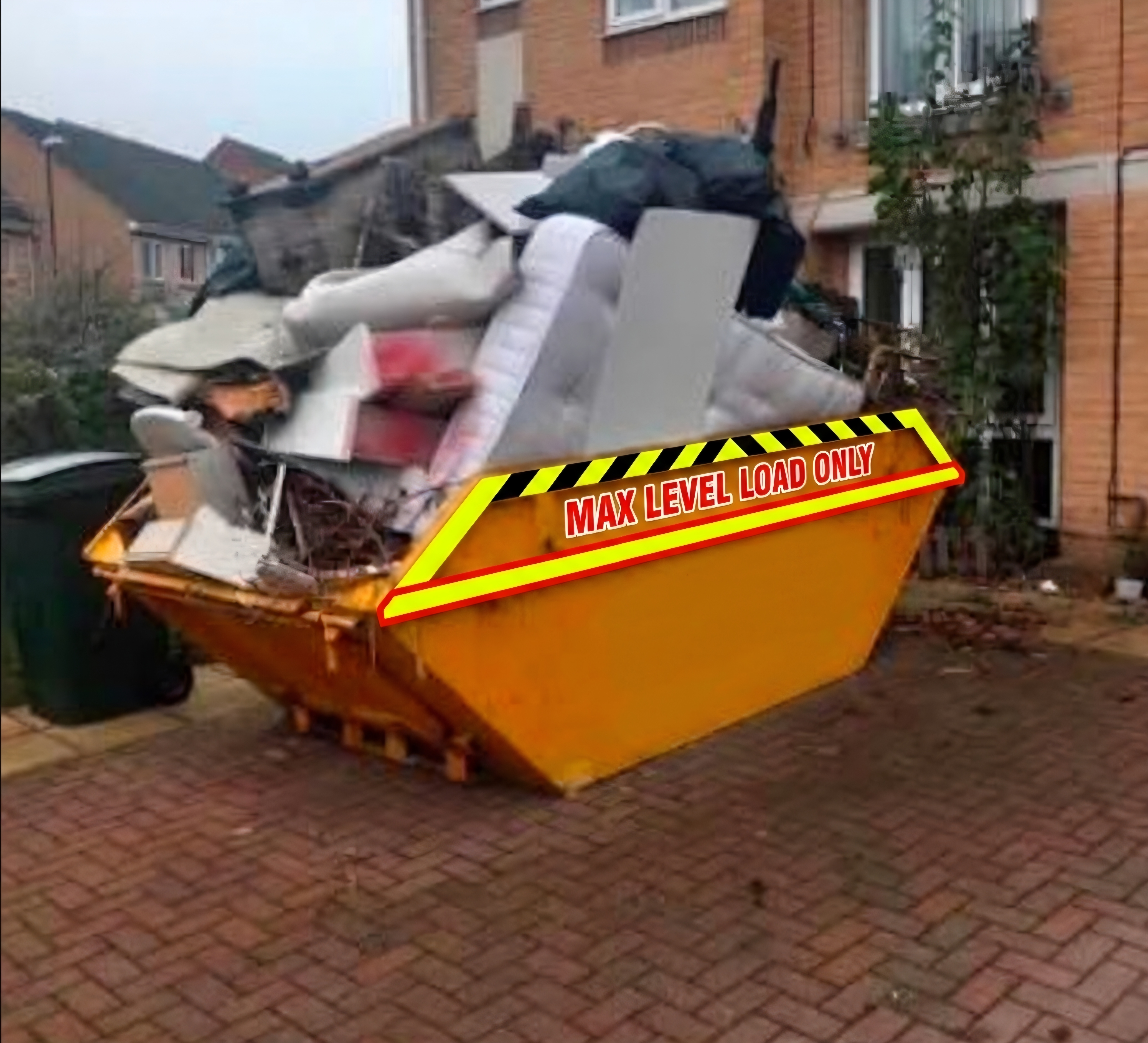 Overloaded skip container on driveway illustrating level load issues
